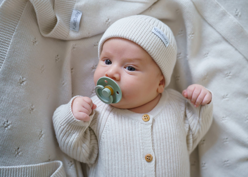 Keep your baby warm and comfortable with our ribbed knit hat, crafted from 100% RWS certified merino wool. Naturally soft, breathable, and gentle on delicate skin, this timeless baby hat is a sustainable essential for everyday wear.