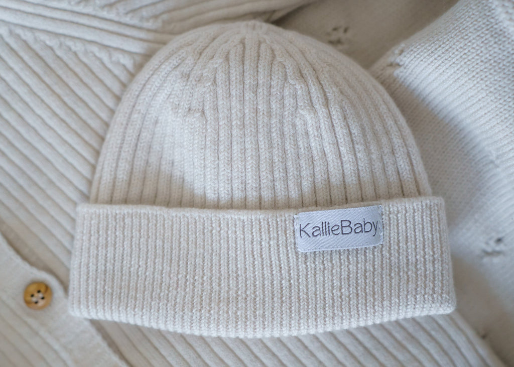 Keep your baby warm and comfortable with our ribbed knit hat, crafted from 100% RWS certified merino wool. Naturally soft, breathable, and gentle on delicate skin, this timeless baby hat is a sustainable essential for everyday wear.