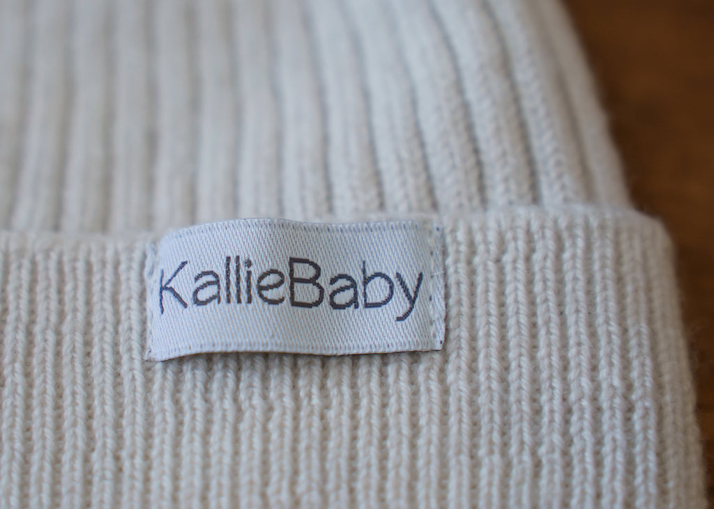 Keep your baby warm and comfortable with our ribbed knit hat, crafted from 100% RWS certified merino wool. Naturally soft, breathable, and gentle on delicate skin, this timeless baby hat is a sustainable essential for everyday wear.