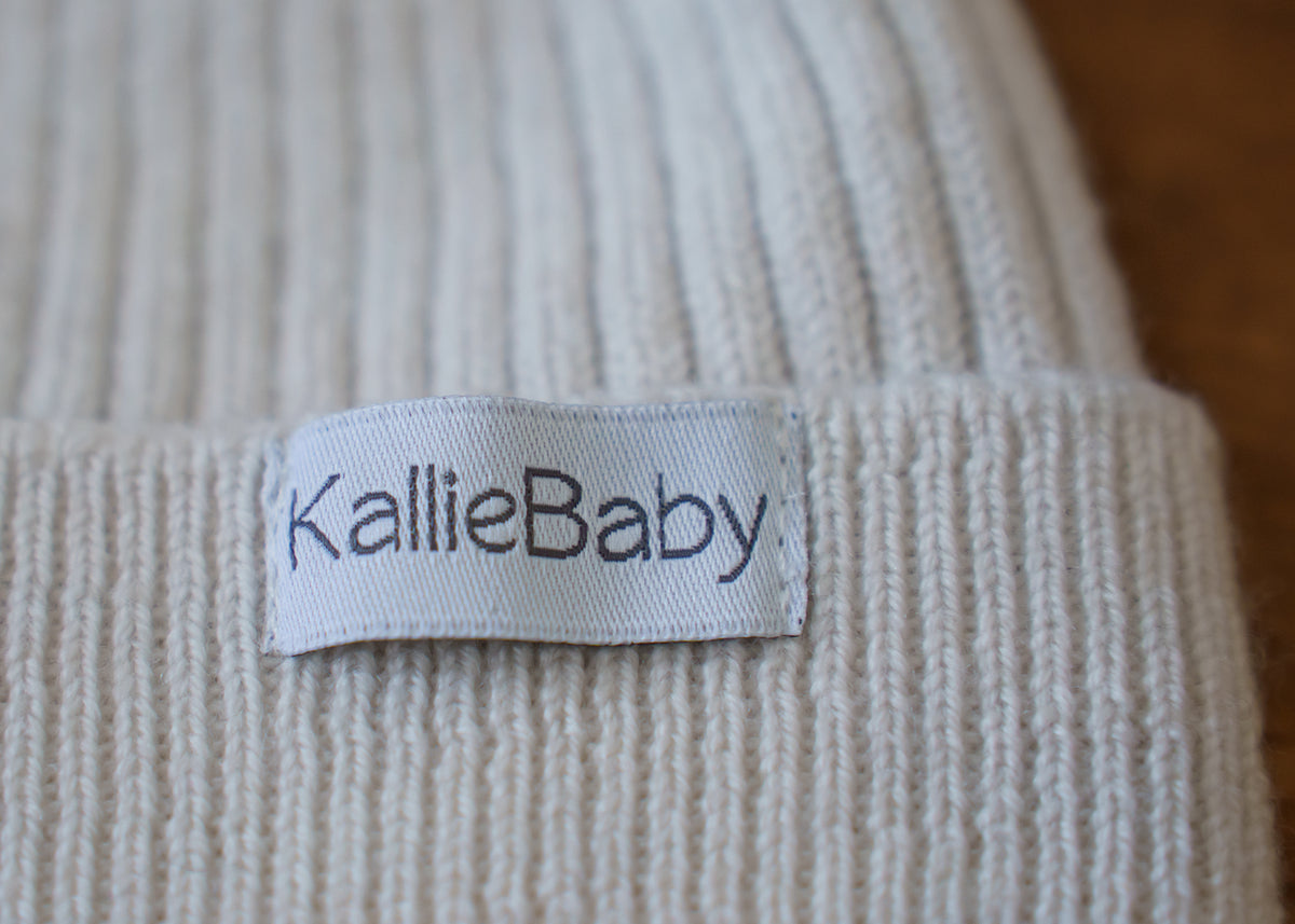Keep your baby warm and comfortable with our ribbed knit hat, crafted from 100% RWS certified merino wool. Naturally soft, breathable, and gentle on delicate skin, this timeless baby hat is a sustainable essential for everyday wear.