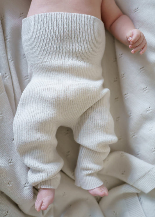 Comfortable ribbed knit pants made from 100% RWS certified merino wool. Soft, stretchy, and breathable, these sustainable baby pants provide warmth without overheating, allowing little ones to move freely every day.