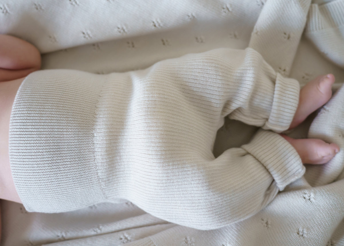 Comfortable ribbed knit pants made from 100% RWS certified merino wool. Soft, stretchy, and breathable, these sustainable baby pants provide warmth without overheating, allowing little ones to move freely every day.